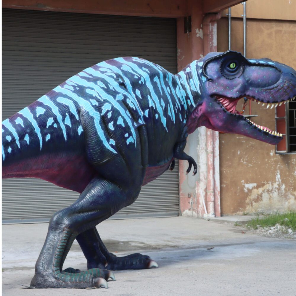 Natureworks Australia Tyrannosaurus Rex - T-Rex dinosaur walking - Large life-size replica with purple and pink accents. - 110073P&Pinkangle view