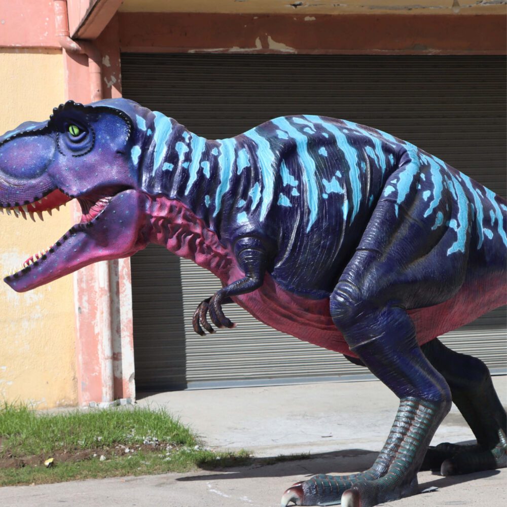 Natureworks Australia Tyrannosaurus Rex - T-Rex dinosaur walking - Large life-size replica with purple and pink accents. - 110073P&Pink - side view