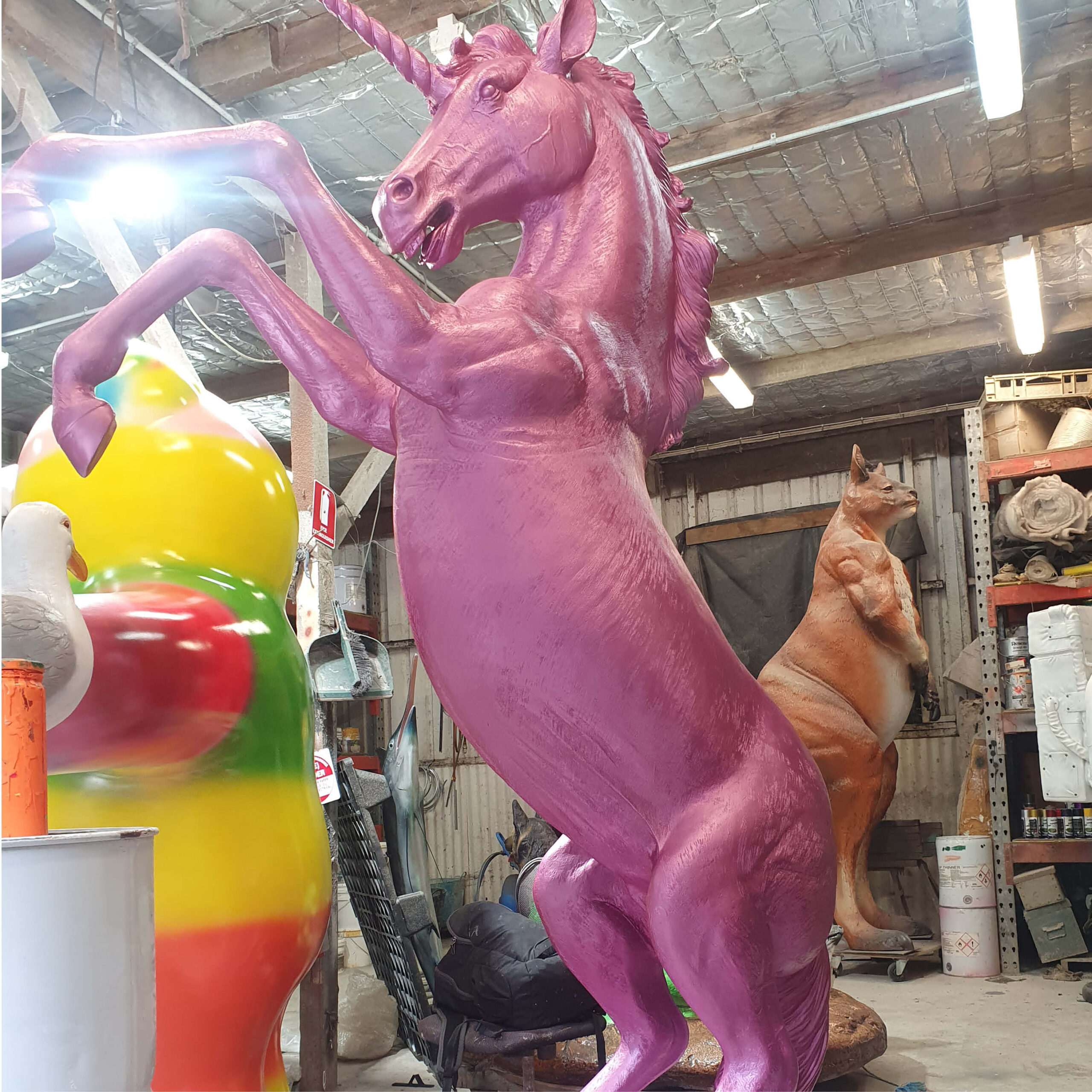 Natureworks Australia Unicorn Rearing statue - full lifesize horse - painted in a Metallic pink NW.140059UPink- shown in paint workshop