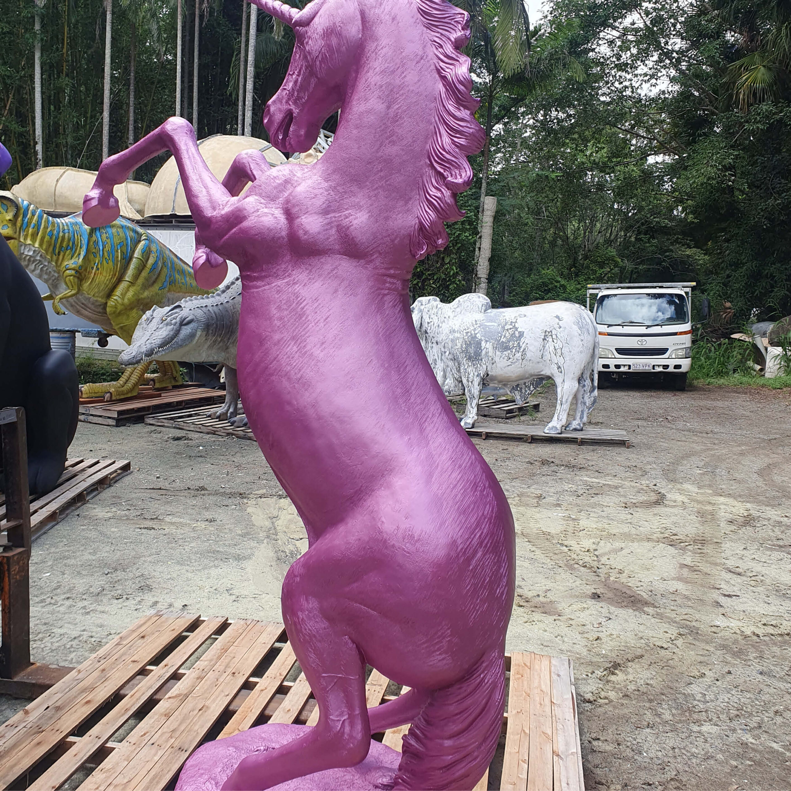 Natureworks Australia Unicorn Rearing statue - full lifesize horse - painted in a Metallic pink. NW.140059UPink - Showing rear angle view