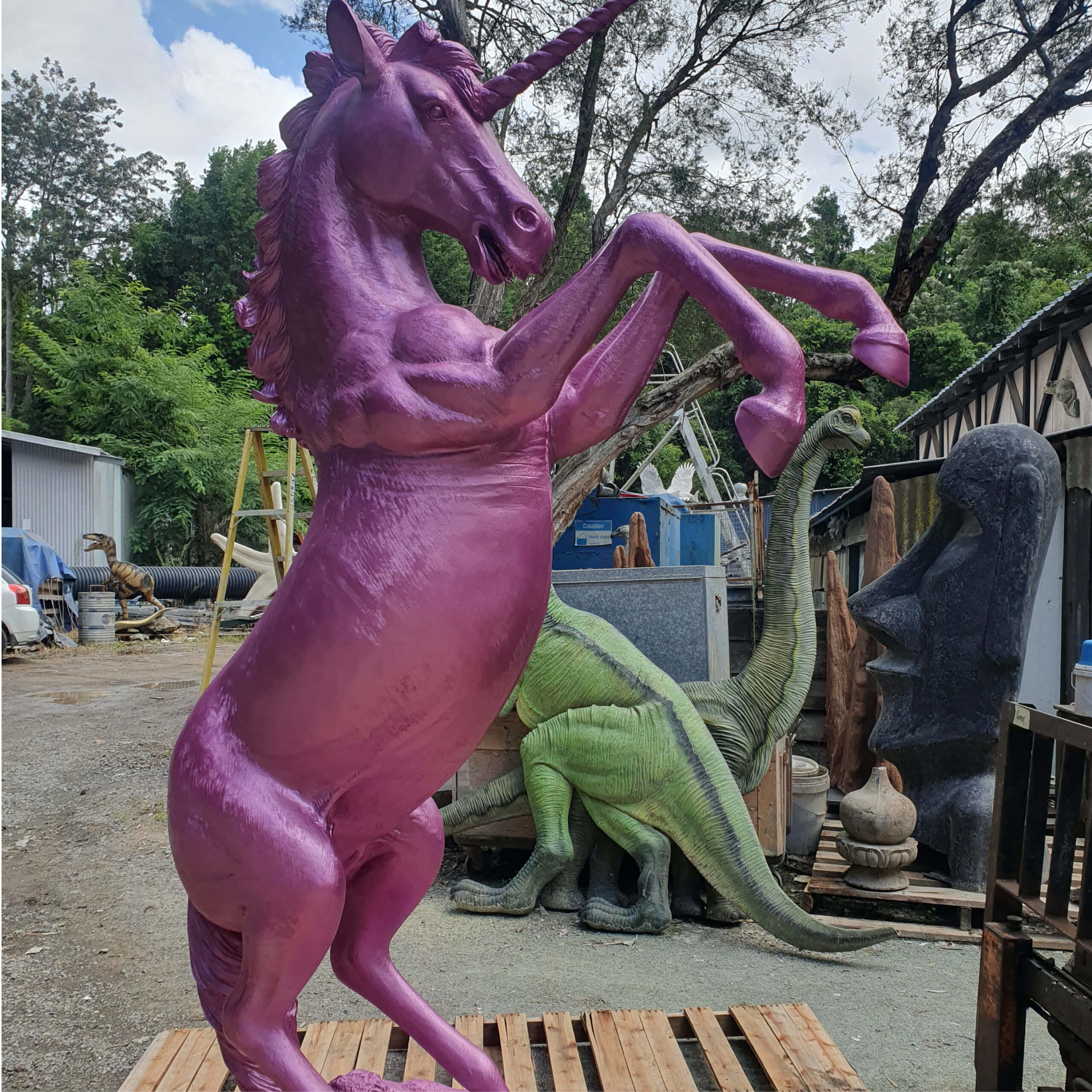 Natureworks Australia Unicorn Rearing statue - full lifesize horse - painted in a Metallic pink. NW.140059UPink - Showing front angle view