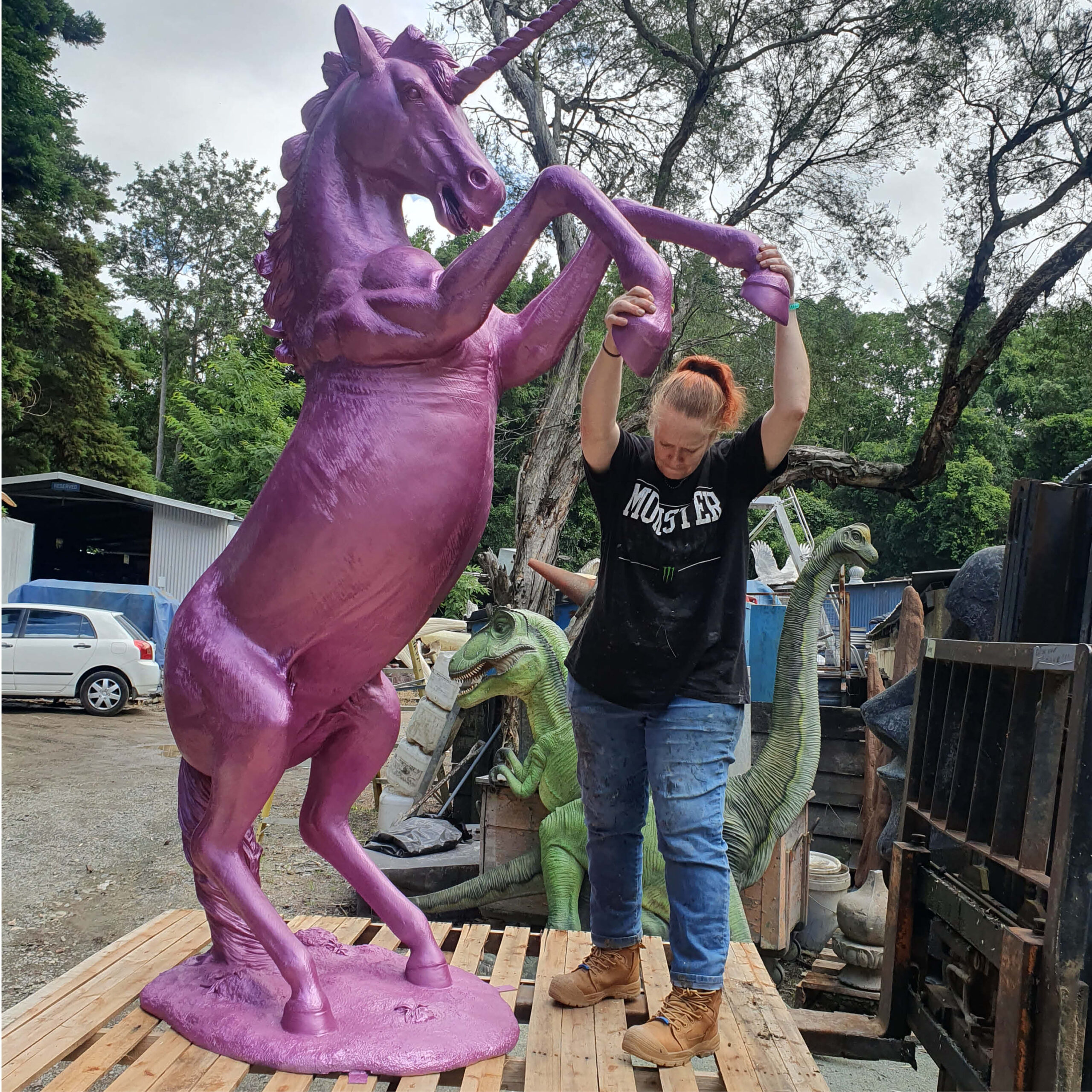 Natureworks Australia Unicorn Rearing statue - full lifesize horse - painted in a Metallic pink. NW.140059UPink - Showing Chev stopping horse from leaping - he he