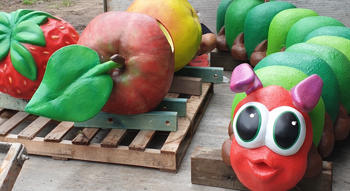 Natureworks Australia Caterpillar play sculpture with giant fruit