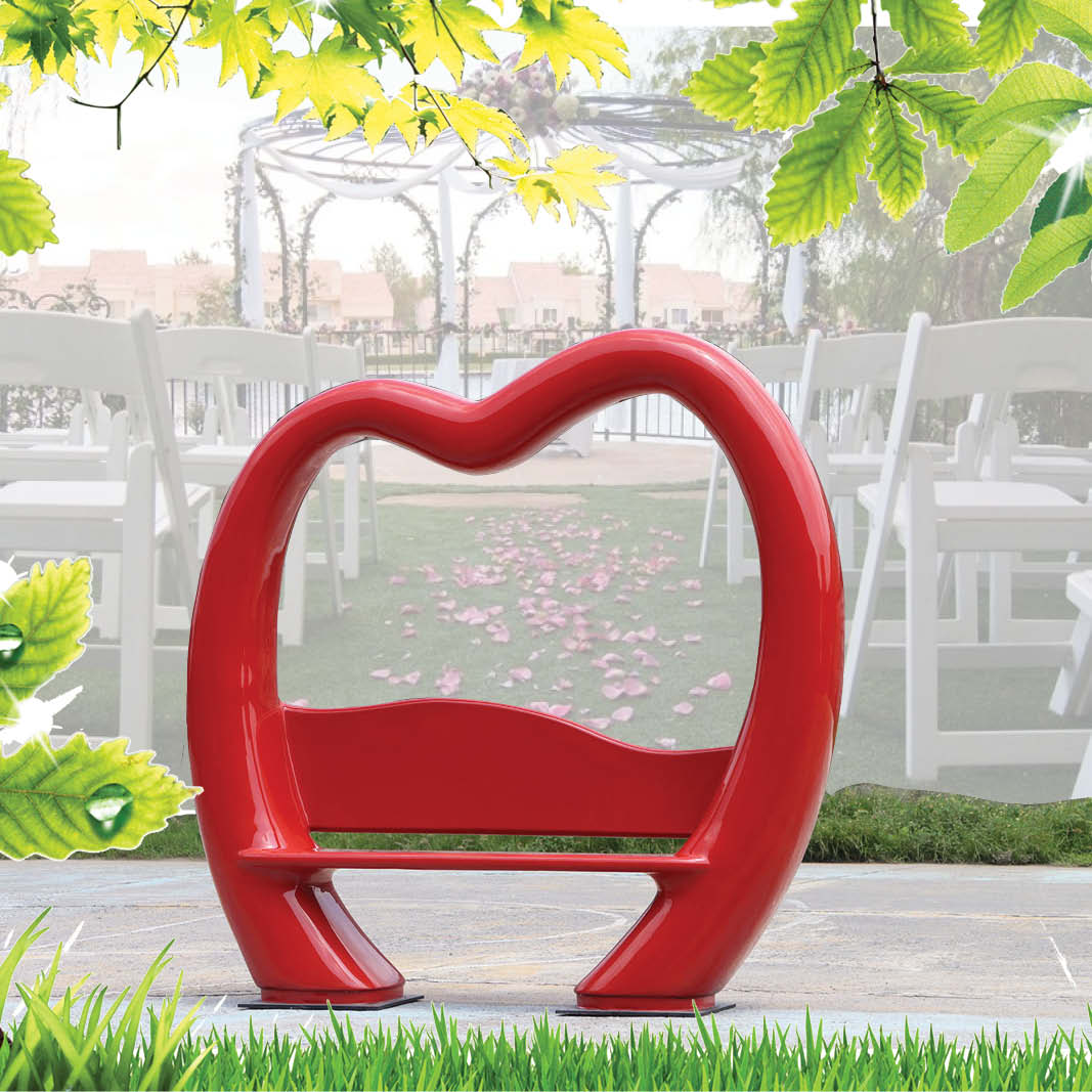 Natureworks Australia Lovers Lounge 240087 - love bench - sturdy construction - bright red colour for weddings and valentines displays- playgrounds, and public parks- shown at wedding venue