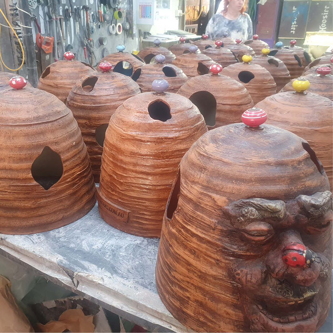 Natureworks Australia Natureworks Cloches - playground themed diorama-showing a collection on a table before installation