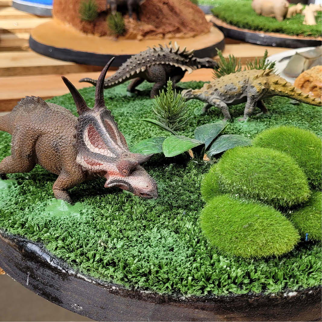 Natureworks Australia Natureworks Cloches - playground themed diorama-with dinosaurs and plants on a grass base