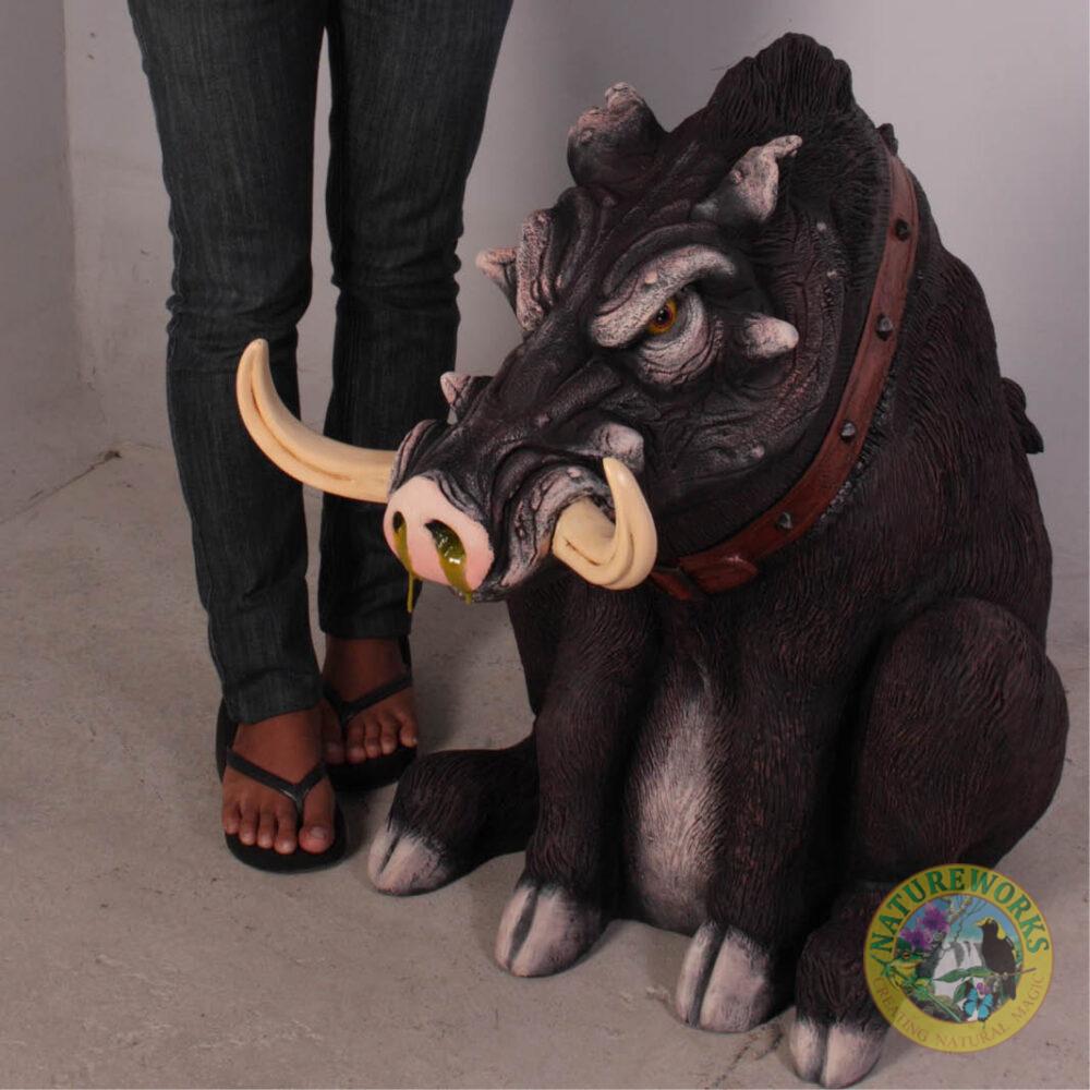 Fugly the guard hog esky with removeable lid/head showing height with lady standing next to fugly