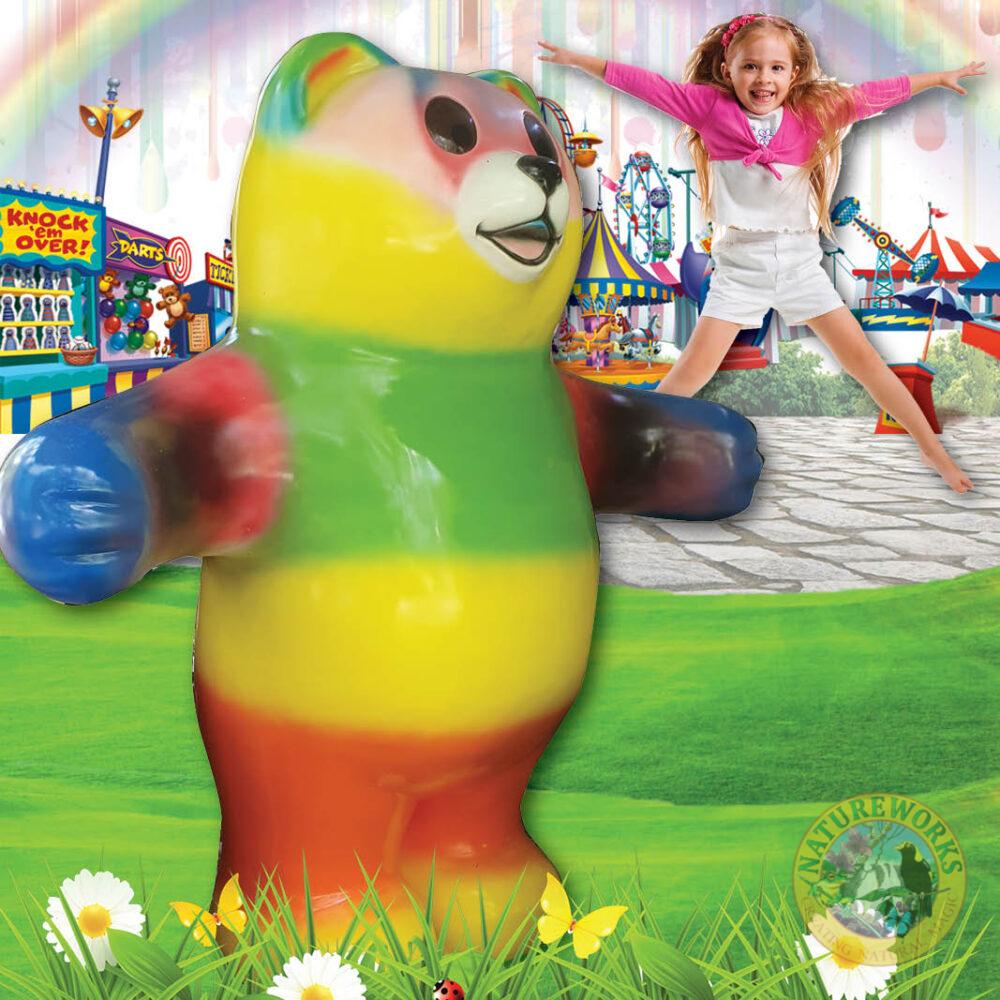 Natureworks Australia Natureworks Gummy Bear - Rainbow coloured -220126 shown with girl jumping in background