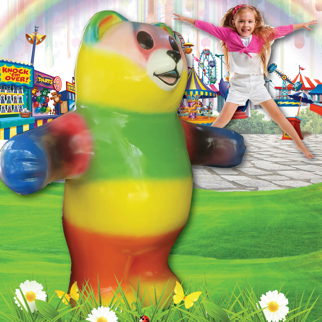 Natureworks Australia Natureworks Gummy Bear - Rainbow coloured -220126 shown with girl jumping in background