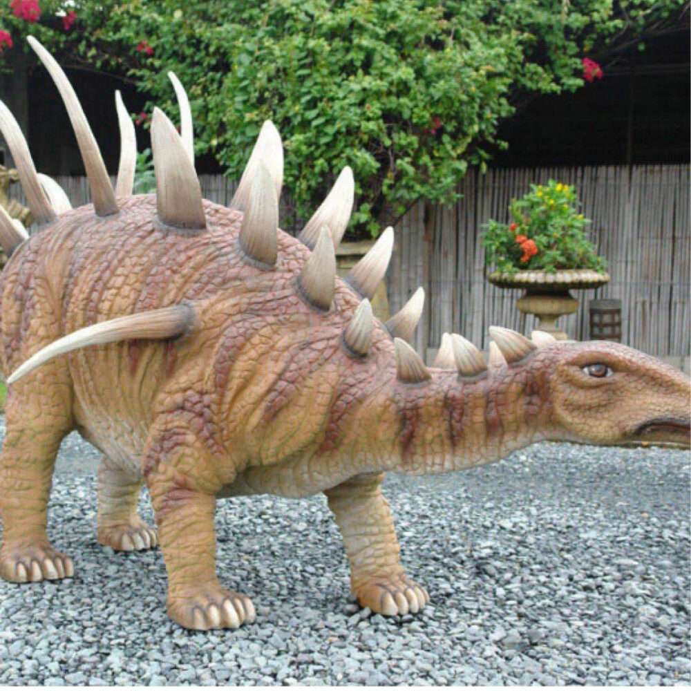 Kentrosaurus Dinosaur with spiky armour on back and tail and a beak like mouth