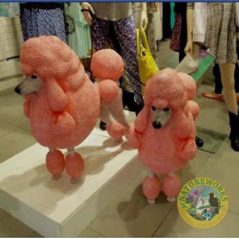 Natureworks Australia Pink Poodle dog statue- shown on plinth in shop display - 110121