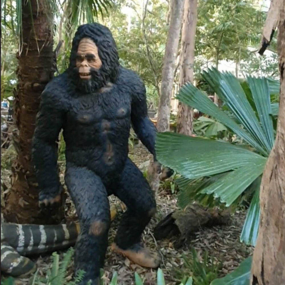 Yowie Statue - 2m tall - also known as a Yeti or bigfoot- shown in the bush- showing full size sin standing pose