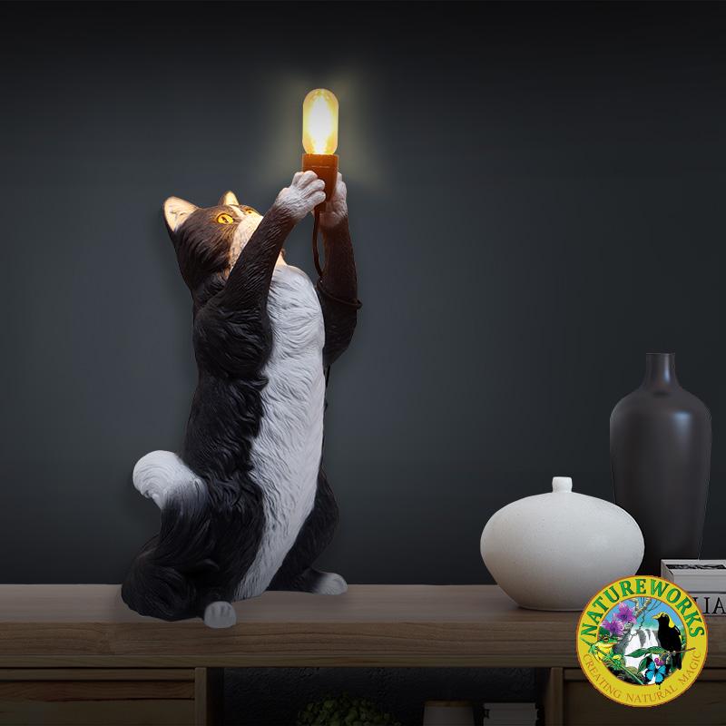 Cat table Lamp - Black & White - lifelike black and white cat inspired by the playful nature and grand size of Maine Coon- L 30 x w 28 x H 66cm - 3kg - SKU 230024