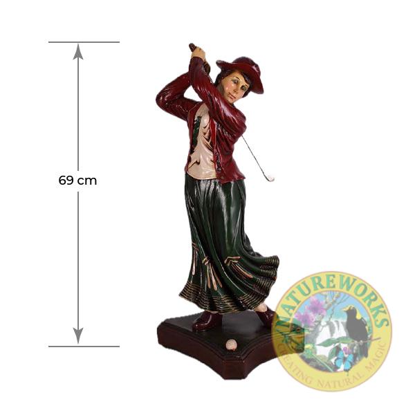 Natureworks Australia Woman golfer statue with maroon jacket and green skirt, on base plate, height 69cm, weight 5kg