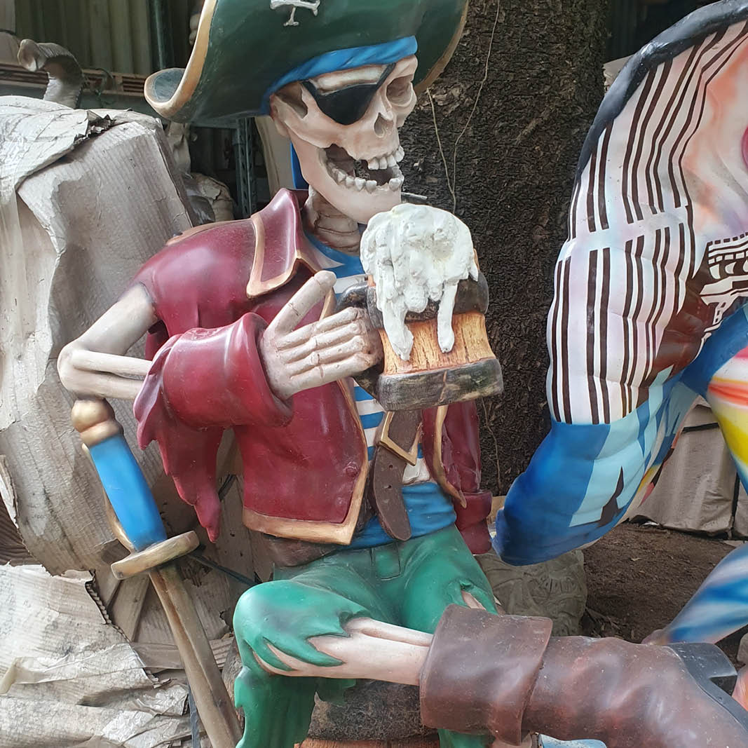 Natureworks Australia Pirate skeleton - sitting on barrel with a tankard of beer- showing close up SKU-TA-C-360