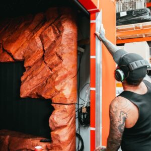 Installing artificial rock walls in the display