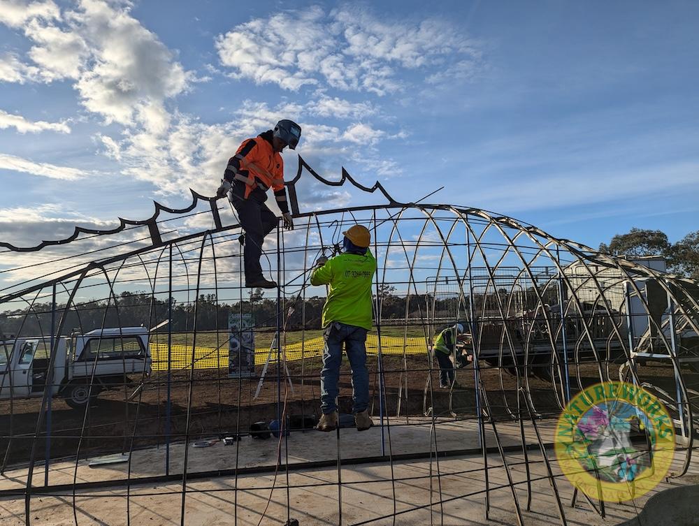 Natureworks Australia Workers add the top fin frame