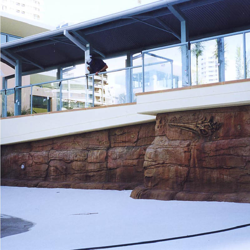 Natureworks Australia Crown Towers resort - Gold Coast - Artificial rock swimming pool in production photo showing embedded fossil on rock wall