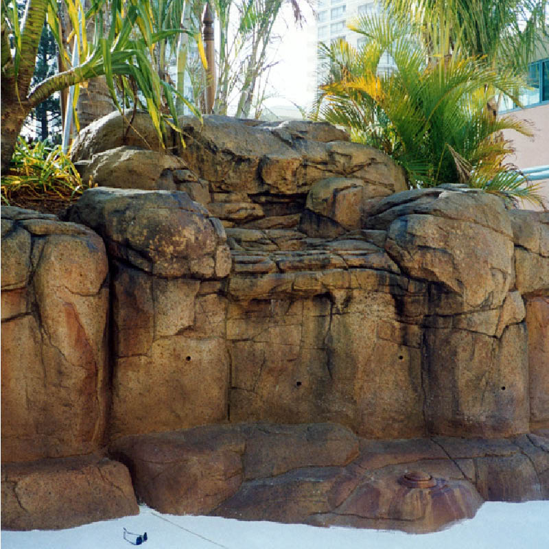 Natureworks Australia Crown Towers resort - Gold Coast - Artificial rock swimming pool in production photo showing live plants scattered among the artificial rock crevices