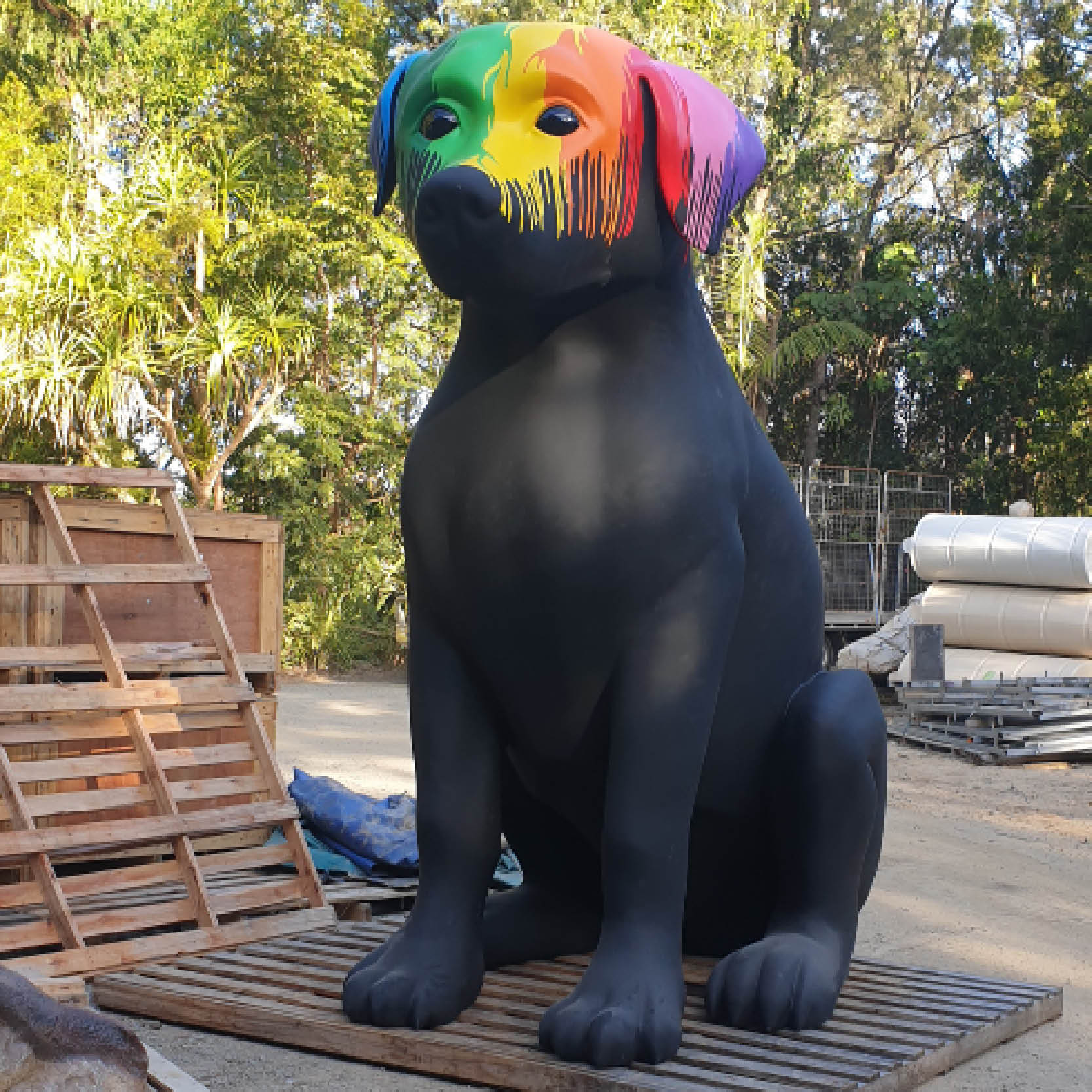 Natureworks Australia Giant Black Dog with Paint drips- 9ft tall sitting - BlackLab2.7m - front angle view