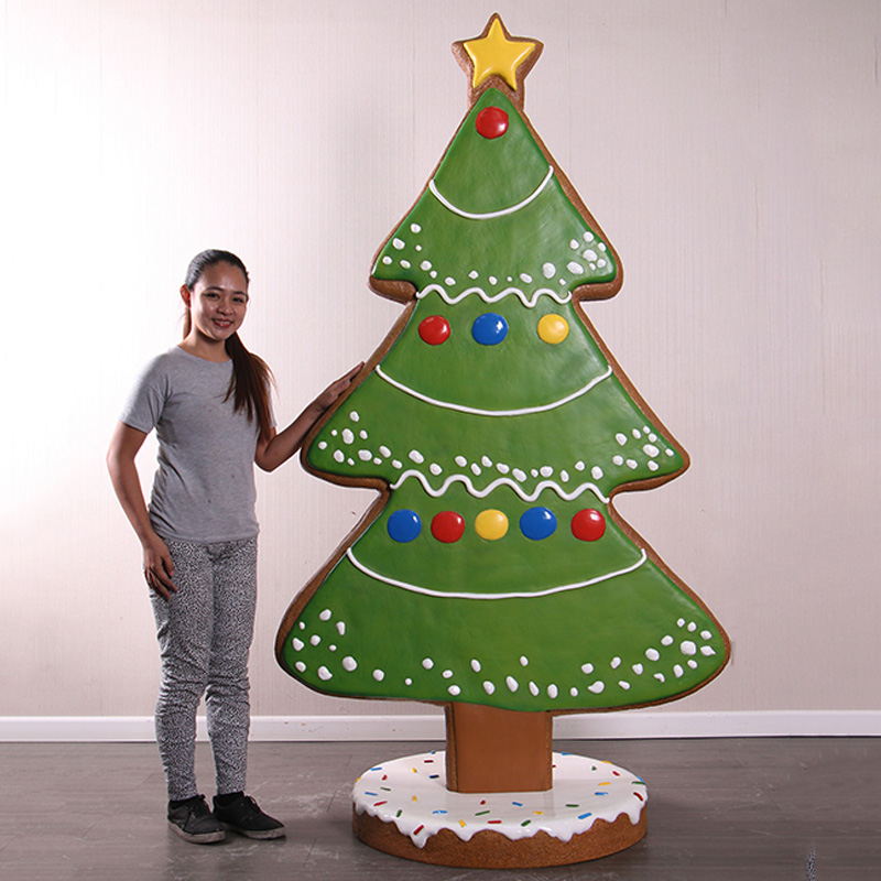 Gingerbread Cookie Christmas tree prop on base plate - 2.1m tall - 240217- shown with girl