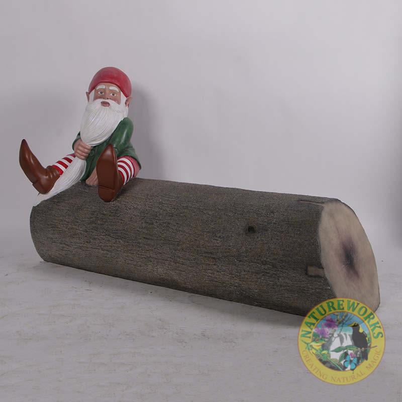 Natureworks Australia Christmas Gnome on tree trunk bench-190096- Angle view showing gnome and tree trunk