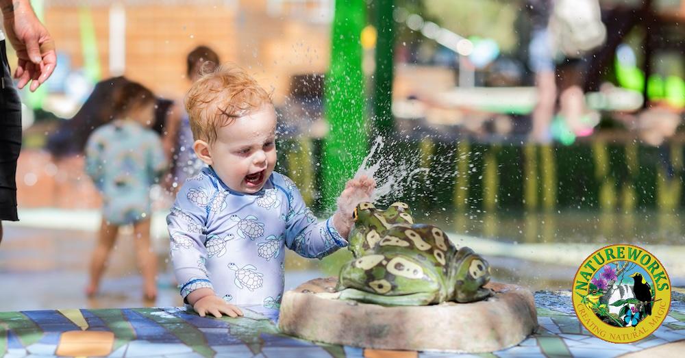 Natureworks Australia Young girl plays with frog squirters at Maylands Waterland Perth