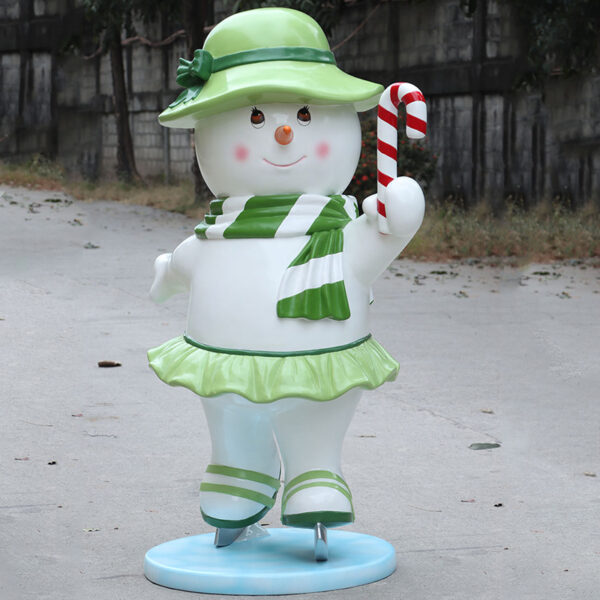 skating snowman mother statue with green hat, skirt and candy cane – Australia display prop