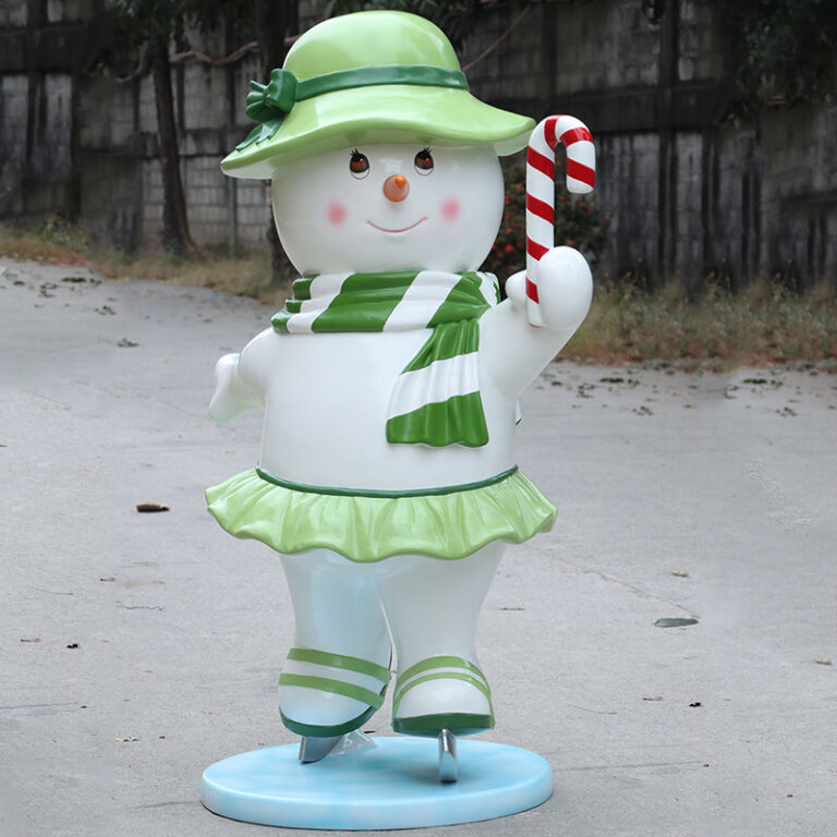 skating snowman mother statue with green hat, skirt and candy cane – Australia display prop