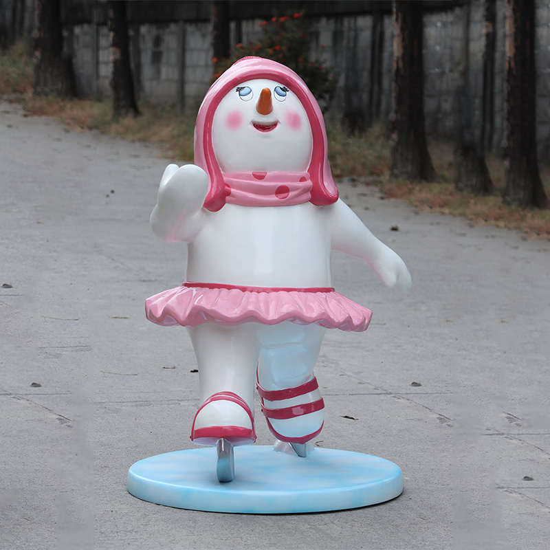 skating snowman girl statue in pink beanie, scarf and skirt – Australia display prop