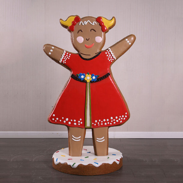 Colourful life-sized Gingerbread Girl with bows and flower belt