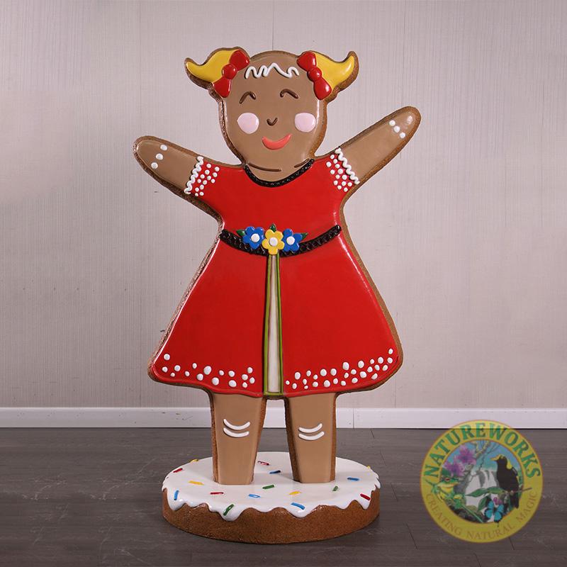 Colourful life-sized Gingerbread Girl with bows and flower belt
