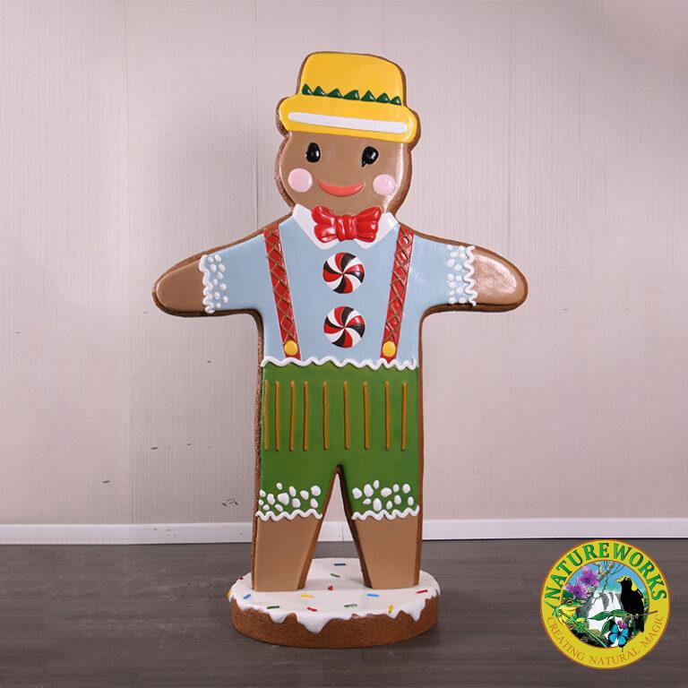 Natureworks Australia Gingerbread Man Statue with yellow hat and red bow tie on iced base