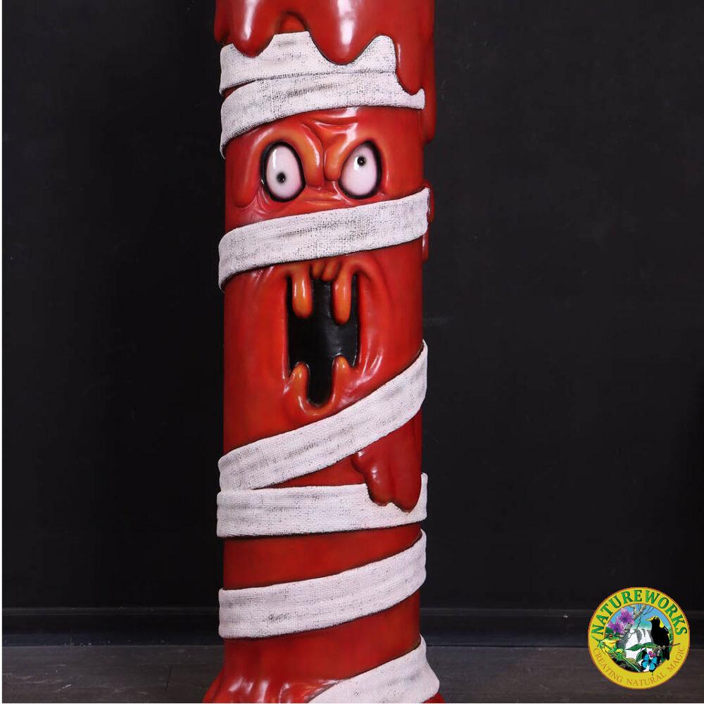 Natureworks Australia Mummy Candle Sculpture — red wax candle wrapped in bandages with flame, life-size Halloween prop