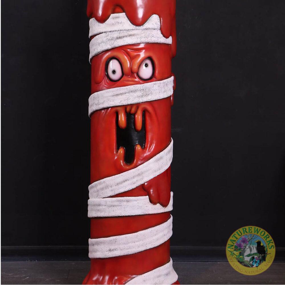Natureworks Australia Mummy Candle Sculpture — red wax candle wrapped in bandages with flame, life-size Halloween prop