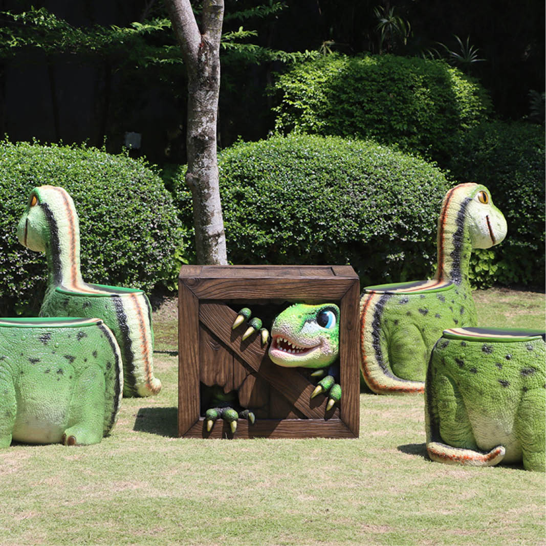 Natureworks Australia Dinosaur Peek-a-Boo table-234136- showing dinosaur furniture collection outside