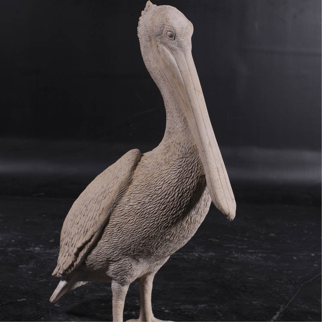 Natureworks Australia Pelican standing - 090073RS - roman stone finish - front angle view