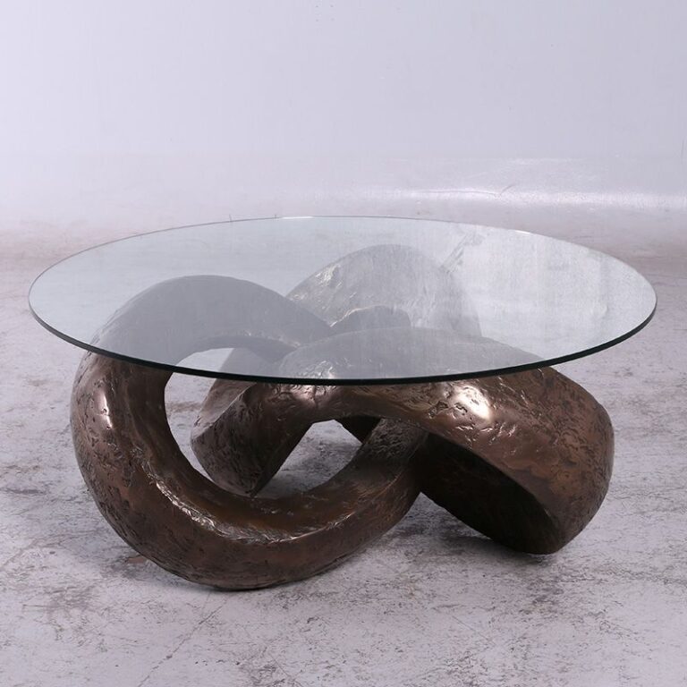 trifoil table base sculpture with round tabletop