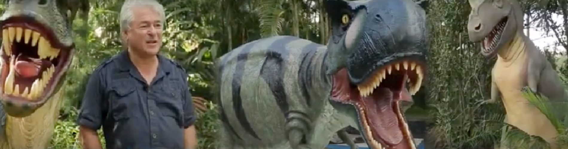 David Joffe from Natureworks, shown with sculptures of dinosaurs and prehistoric animals